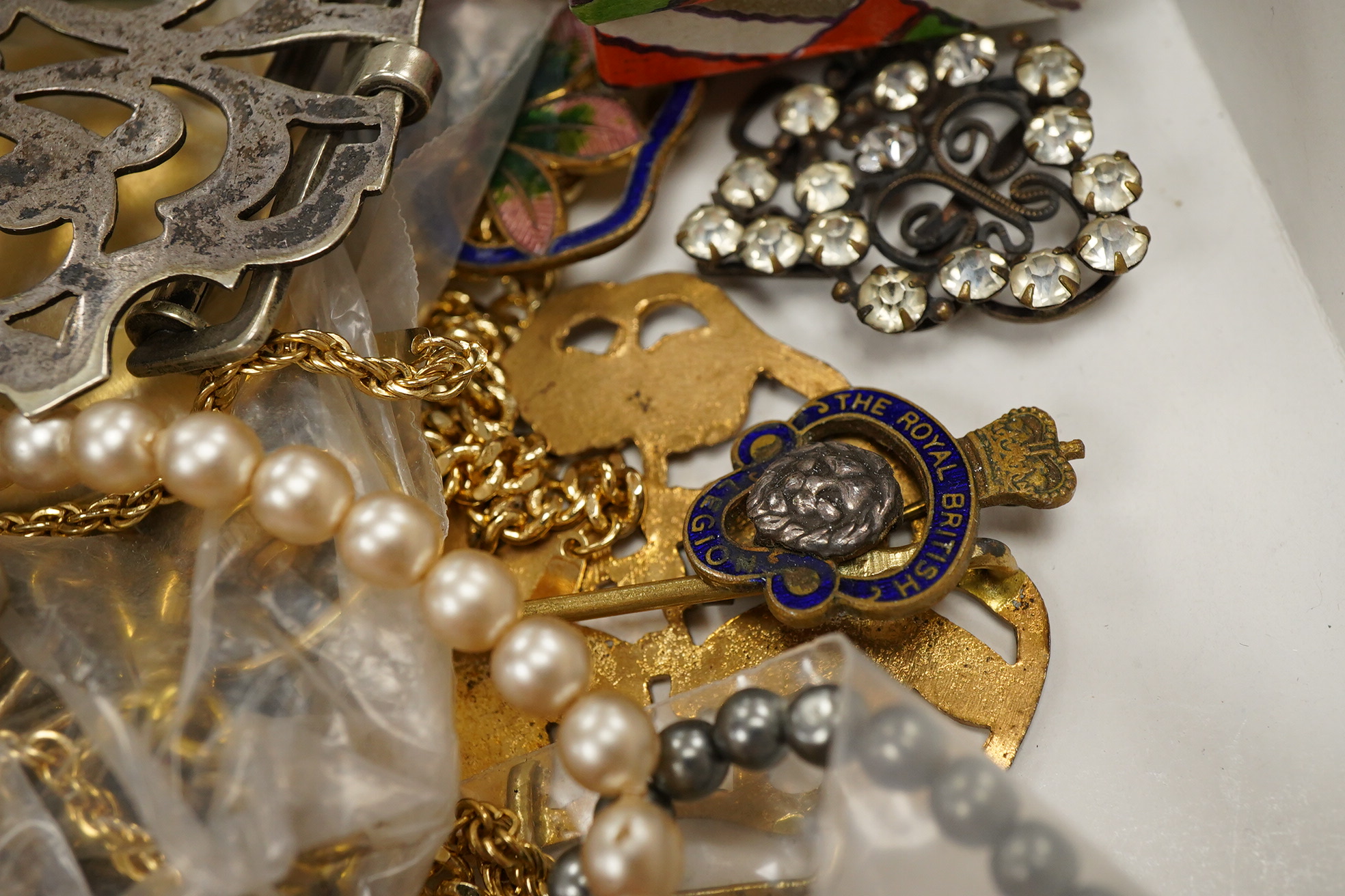 A group of assorted mainly costume jewellery, including bangles, ring, necklaces etc. together with a Cornish Pewter snuff box.